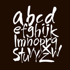 Vector Acrylic Brush Style Hand Drawn Alphabet Font. Calligraphy alphabet on a black background