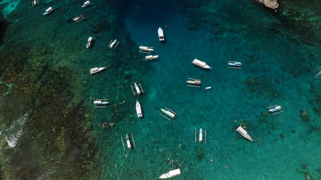 Aerial drone view at boats at lagoon, Bali, Indonesia, 4k