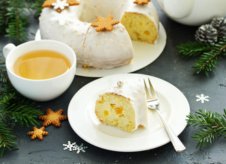 Christmas cupcake with spices, candied fruits, with gingerbread cookies and nuts.
