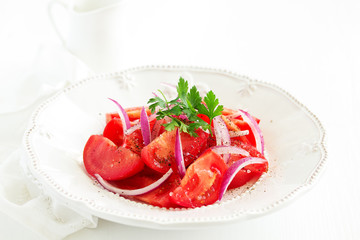 Tomato and onion salad. Selective focus