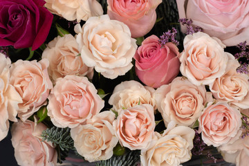 Fresh composition of bright flowers close-up work of florist decorative background