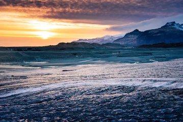 Fototapeten Polarkreis Mountain sunset over the Icelandic glacier in south Iceland  © creativefamily