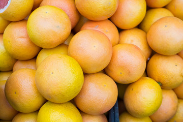 top view texture of fresh grapefruit on a bazaar counter. Vitamins, Healthy Nutrition