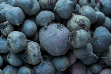 top view texture of beets, dirty, on the market. selling beets in the market. Healthy wholesome food