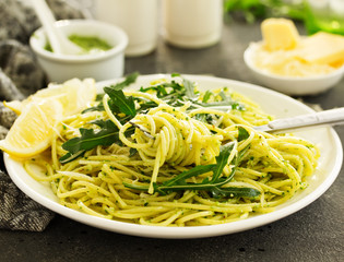 Spaghetti with arugula pesto. Selective focus.