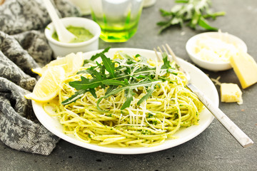 Spaghetti with arugula pesto. Selective focus.