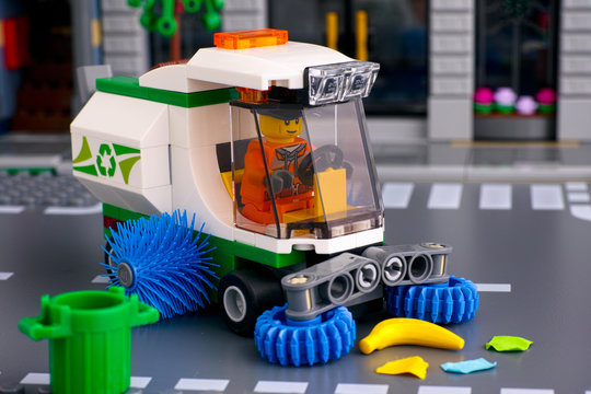 Tambov, Russian Federation - January 17, 2020 Lego Street Sweeper Toy Truck With Brushes With Driver Minifigure Inside Cleaning Street. Studio Shot.