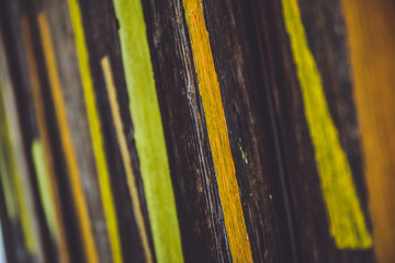 Streaks of paint on a wooden fence
