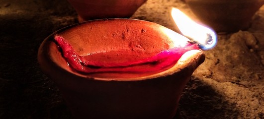 Diwali oil lamp, earthen oil lamp light and shadow 