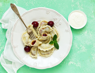Dumplings with cherries. Ukrainian and Belarusian cuisine.