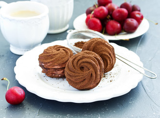 Homemade marshmallows with cherries and chocolate.