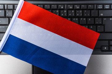  flag of Netherlands  on computer, laptop keyboard