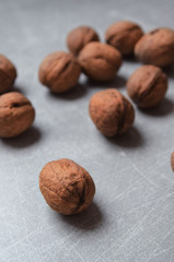 walnuts on a grey surface