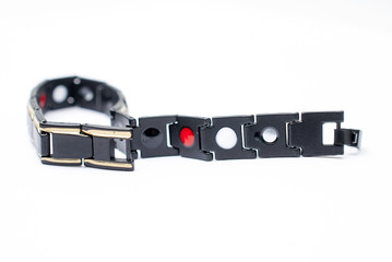 neodymium magnetic bracelet on white background, shallow dof