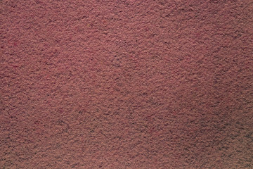 Colored bright felt textile material. Brown color composition. Colorful felt texture for background with copy space. Felt fabric sheet