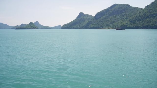 Group of Islands in ocean at Ang Thong National Marine Park near touristic Samui paradise tropical resort. Archipelago in the Gulf of Thailand. Idyllic turquoise sea natural background, copy space