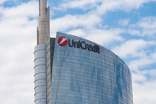 Detail of the Unicredit Bank headquarters skyscraper with company logo sign. Milan, Italy - May 26, 2019