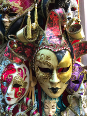 Souvenir Venetian carnival masks on display