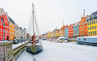 Copenhagen, Denmark - January 5, 2011: Nyhavn (New Harbor)in winter. It is waterfront, canal,...