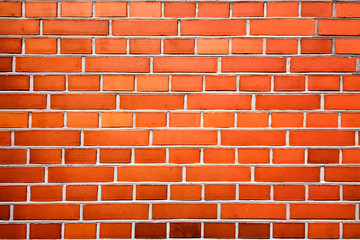 Red color brick wall for brickwork background design . Panorama format