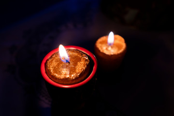 Two candles lit at christmas