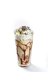 Milk cocktail in a glass on a white background