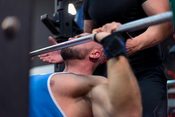 Fototapeta na wymiar Bodybuilding Motivation. Two Bodybuilders Train Together at the Gym. Bodybuilding Hardcore.