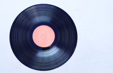 old vinyl record isolated on light background