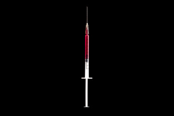 Syringe filled with blood on a black background. Coronavirus concept.