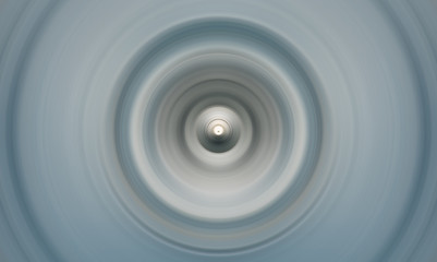 Abstract round background. Circles from the center point. Image of diverging circles. Rotation that creates circles.