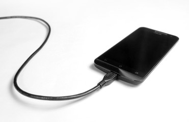 phone with cable, isolated on a white background