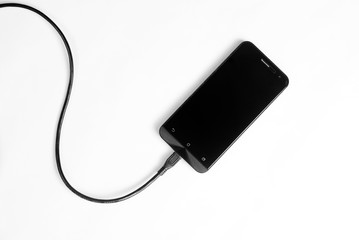 phone with cable, isolated on a white background