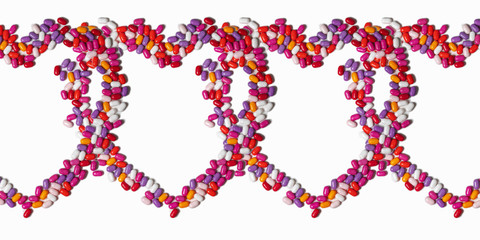 heart of colored pills on a white background. colored pills isolatred on white. empty space for text