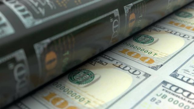 Extreme close-up of US dollars printing press machine printing 100 USD banknotes. Seamlessly looped animation showing how world famous USA currency is being made.