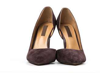 Stylish classic suede women's leather shoes with medium high heels on an isolated white background. Shoe sale / clearance concept announcement.