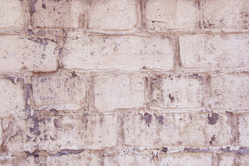 old pastel pink brick wall