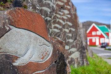 Wales sculpted in stone on Qaqortoq. Greenland