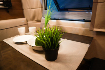 Interior of luxury caravan. Detail photo of coach with equipment.Kitchen
