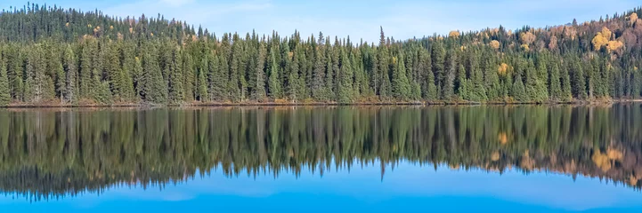 Fotobehang Canada, panorama of a mountain lake in the forest during the Indian summer, beautiful landscape in a wild country, reflection on the water © Pascale Gueret