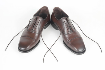 Classic men's brown shoes on white background