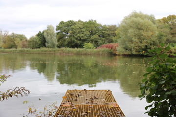 Metal fishing pier on lake