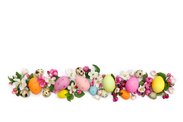 Obraz premium Easter decoration. Pink flowers apple tree and colored easter eggs and quail eggs on white background with space for text. Top view, flat lay
