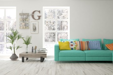 Stylish room in white color with sofa and winter landscape in window. Scandinavian interior design. 3D illustration