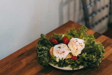 Eggs and salad on plate