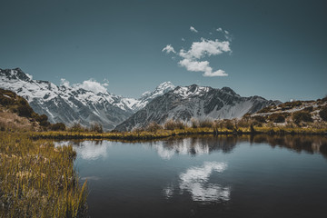 Fototapeta premium Amazing landscape with small tiny lake and mountains in the background