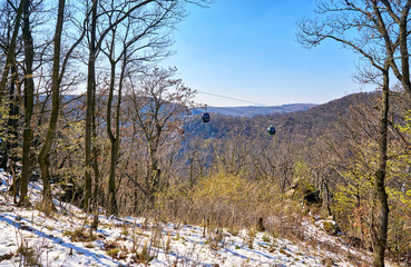 Snow covered mountains with cable car in the background. Saxony-Anhalt, Harz, Germany
