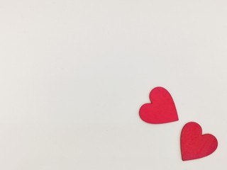 Two red origami hearts on white background. Valentin's Day gift cards. Top view.