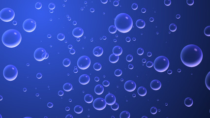 bubbles underwater in deep blue sea