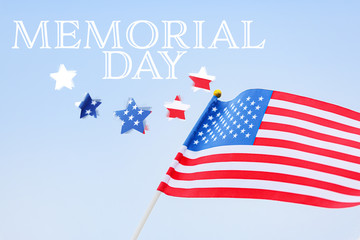 USA flag, stars and text MEMORIAL DAY on blue background
