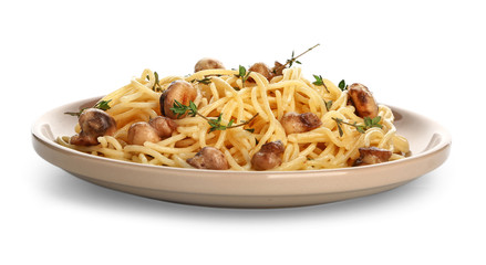 Plate with tasty pasta and mushrooms on white background